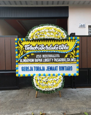 Papan Bunga Duka di Maleer